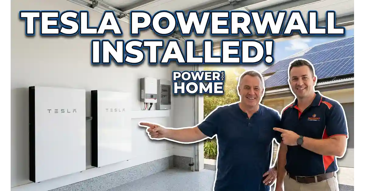 Tesla Powerwall battery installed alongside Tesla solar panels